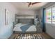 Cozy ' bedroom with a stylish bunk bed featuring built-in steps and storage at 10007 N 30Th Pl, Phoenix, AZ 85028
