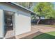Bright guest house exterior with an open door showing a glimpse of the cozy interior at 10007 N 30Th Pl, Phoenix, AZ 85028