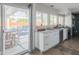 This kitchen features modern appliances and ample natural light from the sliding doors to the patio at 10007 N 30Th Pl, Phoenix, AZ 85028