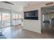 Bright and open living space featuring a seamless connection to the kitchen and outdoor patio area at 10007 N 30Th Pl, Phoenix, AZ 85028
