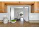 View from kitchen through pass-through showcasing the living area's bright and airy atmosphere at 10215 W Missouri Ave, Glendale, AZ 85307