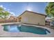Backyard featuring a private in-ground pool and covered patio area perfect for entertaining at 10465 E Dutchmans Trl, Gold Canyon, AZ 85118