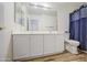 Bathroom features a dual-sink vanity with white cabinets and modern fixtures, and a toilet at 10465 E Dutchmans Trl, Gold Canyon, AZ 85118