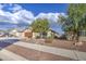 Charming single-story home with desert landscaping and a well-maintained front yard at 10465 E Dutchmans Trl, Gold Canyon, AZ 85118