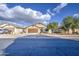 Beautiful single-story home featuring desert landscaping and a spacious two-car garage at 10465 E Dutchmans Trl, Gold Canyon, AZ 85118