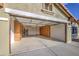 Spacious garage with built-in cabinets for ample storage and an automatic door at 10465 E Dutchmans Trl, Gold Canyon, AZ 85118
