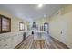 Bright kitchen features white cabinets, marble countertops, stainless steel appliances and central island at 10465 E Dutchmans Trl, Gold Canyon, AZ 85118