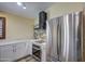 Bright kitchen features white cabinets, marble countertops and stainless steel appliances at 10465 E Dutchmans Trl, Gold Canyon, AZ 85118
