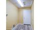 Functional laundry room with neutral tones, utility connections, and convenient access to the exterior at 10465 E Dutchmans Trl, Gold Canyon, AZ 85118