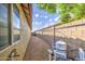 Side yard featuring pool equipment and a narrow gravel pathway at 10465 E Dutchmans Trl, Gold Canyon, AZ 85118