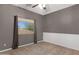 Bedroom with carpeted floor and view of roofline at 10758 E Lobo Ave, Mesa, AZ 85209