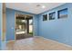 Bright room with tile floors and a view of the pool, accessed through a sliding glass door at 10758 E Lobo Ave, Mesa, AZ 85209