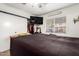 Bedroom with a sliding door closet and a window with view to the outside at 11221 W Devonshire Ave, Phoenix, AZ 85037