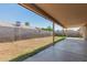 Expansive backyard with concrete patio and potential for lush landscaping at 11341 W Barbara Ave, Peoria, AZ 85345
