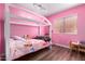 Bright bedroom with a fun bed, natural light, and playful decor at 11341 W Barbara Ave, Peoria, AZ 85345
