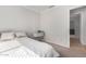 Relaxing bedroom with neutral color and view to living room area at 11341 W Barbara Ave, Peoria, AZ 85345