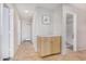 Hallway with tile flooring and cabinet in neutral color at 11341 W Barbara Ave, Peoria, AZ 85345