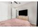 Comfortable bedroom showcasing soft carpet and ensuite bathroom at 11526 E Shepperd Ave, Mesa, AZ 85212