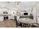 Spacious open-concept featuring a kitchen and living room area with stylish furnishings and lots of natural light at 11526 E Shepperd Ave, Mesa, AZ 85212