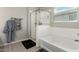 Bathroom with separate soaking tub and glass enclosed shower at 12357 W Whyman Ave, Avondale, AZ 85323