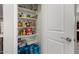 Pantry with full shelving and an ample supply of food and beverages at 12357 W Whyman Ave, Avondale, AZ 85323