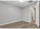 Bedroom featuring wood-look flooring and ceiling fan at 1258 W Plane Tree Ave, San Tan Valley, AZ 85140