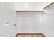 Walk-in closet with custom shelving at 1258 W Plane Tree Ave, San Tan Valley, AZ 85140