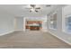 Bright, open-concept living space seamlessly connects to the modern kitchen at 1258 W Plane Tree Ave, San Tan Valley, AZ 85140