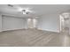 Neutral living room with modern fixtures and spacious open layout at 1258 W Plane Tree Ave, San Tan Valley, AZ 85140