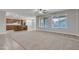 Open-concept living area showcases the kitchen with a center island at 1258 W Plane Tree Ave, San Tan Valley, AZ 85140