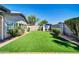 Beautiful backyard with turf, block wall, and a shed at 13233 W Mauna Loa Ln, Surprise, AZ 85379