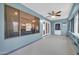 Light blue sun room with lots of windows and natural lighting at 13233 W Mauna Loa Ln, Surprise, AZ 85379
