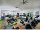 Spacious fitness center featuring modern exercise equipment and mirrored walls at 14571 W Wethersfield Rd, Surprise, AZ 85379