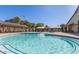Sparkling pool with lounge chairs, providing the perfect place to soak up the sun and unwind at 14571 W Wethersfield Rd, Surprise, AZ 85379