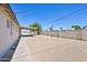 Large backyard featuring a covered patio area, perfect for relaxing outdoors and enjoying the sunshine at 1532 W 6Th St, Tempe, AZ 85281