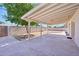 Spacious covered patio with a fire pit, providing an ideal space for outdoor entertaining at 1532 W 6Th St, Tempe, AZ 85281