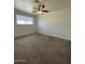 Bedroom with a ceiling fan and window at 1532 W 6Th St, Tempe, AZ 85281