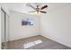 Bedroom featuring ceiling fan, carpeted floor, and ample natural light at 1532 W 6Th St, Tempe, AZ 85281