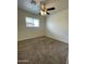 Cozy bedroom with carpet and a ceiling fan at 1532 W 6Th St, Tempe, AZ 85281