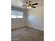 Bedroom featuring neutral carpet, ample natural light, and ceiling fan at 1532 W 6Th St, Tempe, AZ 85281