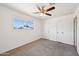 This bedroom features carpeted floor, ceiling fan and 2 closets for ample storage at 1532 W 6Th St, Tempe, AZ 85281