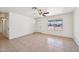Spacious living room with tile flooring, a ceiling fan, and ample natural light at 1532 W 6Th St, Tempe, AZ 85281