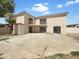 View of the home's backyard, showcasing the patio and upper balcony at 15650 N 19Th Ave # 1206, Phoenix, AZ 85023