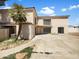 Charming two-story stucco home featuring a mix of desert landscaping and a long driveway at 15650 N 19Th Ave # 1206, Phoenix, AZ 85023