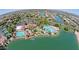 Beautiful aerial view of the community, showcasing lakes, community pool, clubhouse, and green spaces at 1633 E Lakeside Dr # 154, Gilbert, AZ 85234