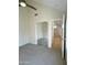 Bedroom with mirrored closet doors and ensuite access to another bedroom at 1633 E Lakeside Dr # 154, Gilbert, AZ 85234