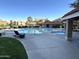 Outdoor pool and spa offers a relaxing atmosphere, complete with lounge chairs and beautiful landscaping at 1633 E Lakeside Dr # 154, Gilbert, AZ 85234