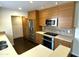 Well-appointed kitchen featuring stainless steel appliances and modern countertops at 1633 E Lakeside Dr # 154, Gilbert, AZ 85234