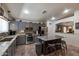 Well-equipped kitchen features stainless steel appliances and a kitchen island with barstool seating at 16461 W Central St, Surprise, AZ 85388