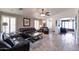 Spacious living room featuring tile floors, neutral paint and comfortable seating at 16461 W Central St, Surprise, AZ 85388